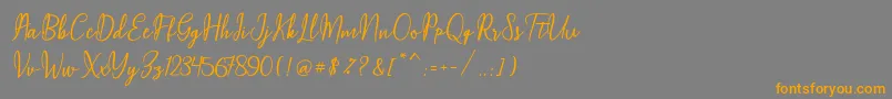 fuente Maqella Script – Fuentes Naranjas Sobre Fondo Gris