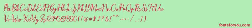 フォントMaqella Script – 赤い文字の緑の背景