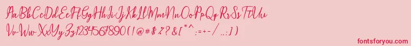 フォントMaqella Script – ピンクの背景に赤い文字