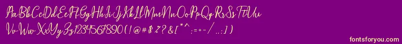 フォントMaqella Script – 紫の背景に黄色のフォント