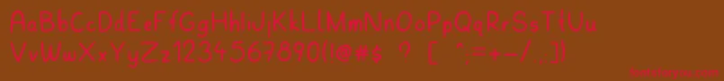フォントMarbelous – 赤い文字が茶色の背景にあります。