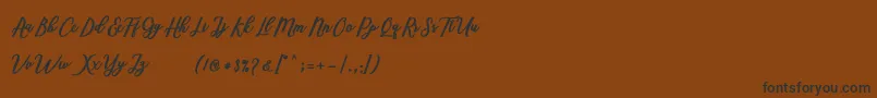 Шрифт Marcela Script – чёрные шрифты на коричневом фоне