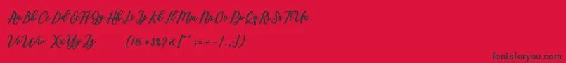 Marcela Script Font – Black Fonts on Red Background