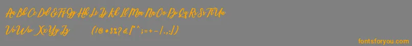 Шрифт Marcela Script – оранжевые шрифты на сером фоне