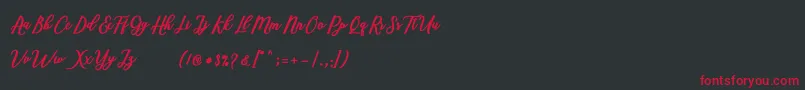 Czcionka Marcela Script – czerwone czcionki na czarnym tle