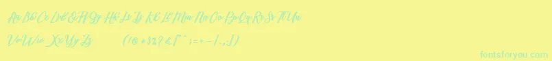 Marcela Script-Schriftart – Grüne Schriften auf gelbem Hintergrund