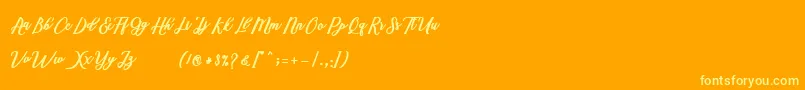 Marcela Script Font – Yellow Fonts on Orange Background