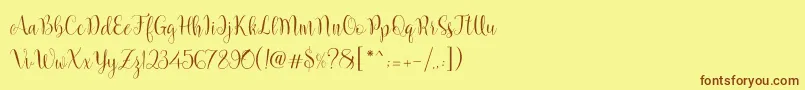 Marcellina Script-Schriftart – Braune Schriften auf gelbem Hintergrund