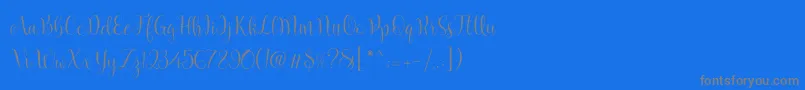 Marcellina Script-Schriftart – Graue Schriften auf blauem Hintergrund