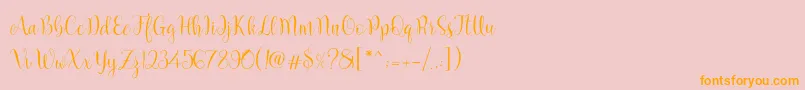 フォントMarcellina Script – オレンジの文字がピンクの背景にあります。