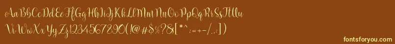 Marcellina Script-fontti – keltaiset fontit ruskealla taustalla