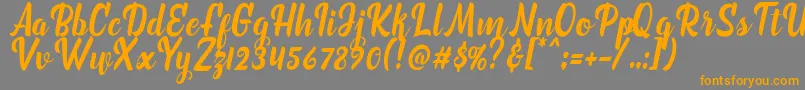 marchelina script Font – Orange Fonts on Gray Background