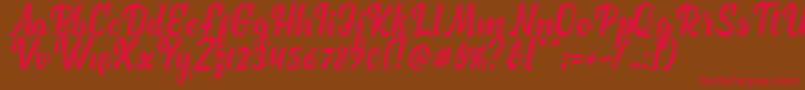 marchelina script Font – Red Fonts on Brown Background