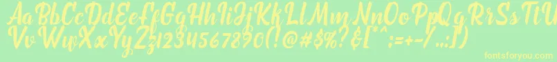 marchelina script Font – Yellow Fonts on Green Background