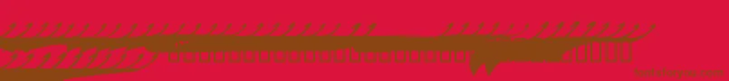 Czcionka MARCS    – brązowe czcionki na czerwonym tle