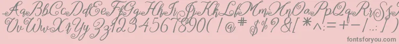marganbetan-Schriftart – Graue Schriften auf rosa Hintergrund