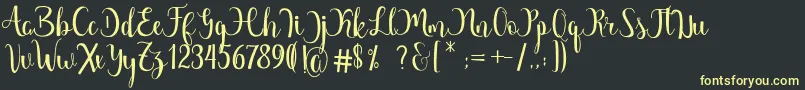 Margarita Free Font – Yellow Fonts on Black Background