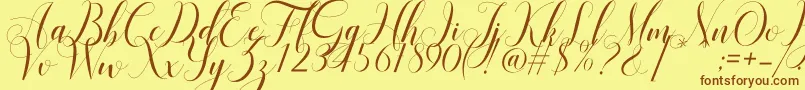 Mariana Oghawa-Schriftart – Braune Schriften auf gelbem Hintergrund