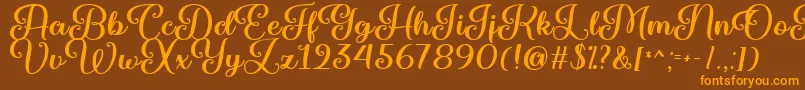 Marienkaefer   Font – Orange Fonts on Brown Background