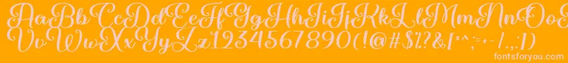 Marienkaefer  -Schriftart – Rosa Schriften auf orangefarbenem Hintergrund