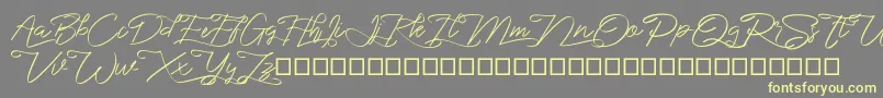 marikita Font – Yellow Fonts on Gray Background