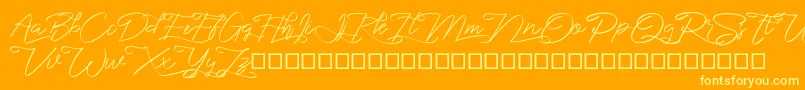 marikita Font – Yellow Fonts on Orange Background