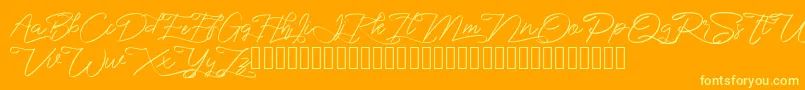 marikita Font – Yellow Fonts on Orange Background