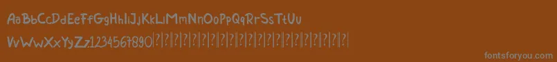 Шрифт Marion   Handwritten Demo – серые шрифты на коричневом фоне