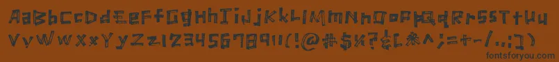 MarkerScratch Regular-Schriftart – Schwarze Schriften auf braunem Hintergrund