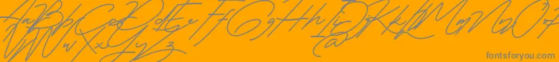 Marlies Free-Schriftart – Graue Schriften auf orangefarbenem Hintergrund