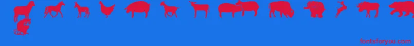 フォントFarmwildanimalsCsp – 赤い文字の青い背景