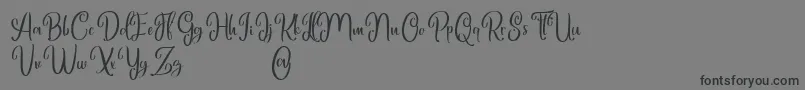 Marlyana free for personal use-Schriftart – Schwarze Schriften auf grauem Hintergrund