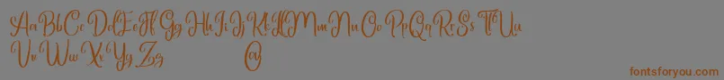 Marlyana free for personal use-Schriftart – Braune Schriften auf grauem Hintergrund