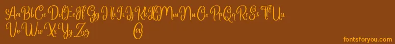 Шрифт Marlyana free for personal use – оранжевые шрифты на коричневом фоне