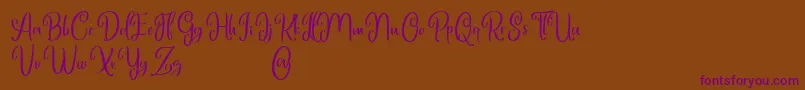 Marlyana free for personal use-Schriftart – Violette Schriften auf braunem Hintergrund