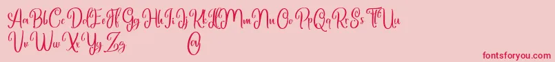 Marlyana free for personal use-Schriftart – Rote Schriften auf rosa Hintergrund