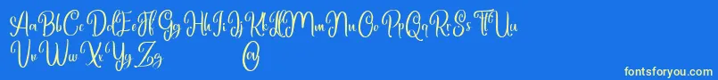 Marlyana free for personal use Font – Yellow Fonts on Blue Background