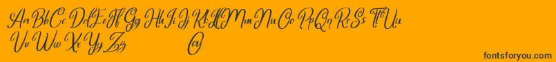 Marlyana italic free for personal use-Schriftart – Schwarze Schriften auf orangefarbenem Hintergrund