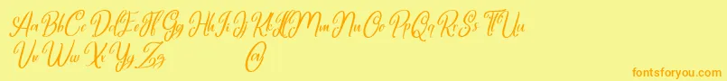 フォントMarlyana italic free for personal use – オレンジの文字が黄色の背景にあります。