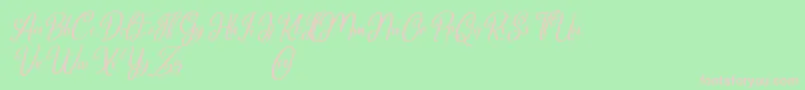 Marlyana italic free for personal use-Schriftart – Rosa Schriften auf grünem Hintergrund