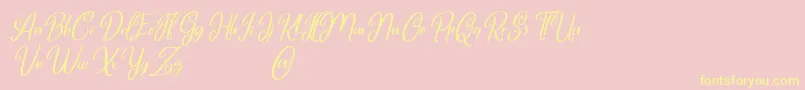 フォントMarlyana italic free for personal use – 黄色のフォント、ピンクの背景