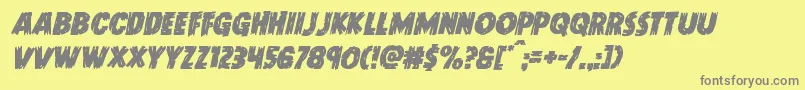 フォントDoktermonstroital – 黄色の背景に灰色の文字
