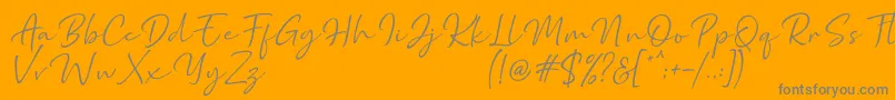Marthin-Schriftart – Graue Schriften auf orangefarbenem Hintergrund