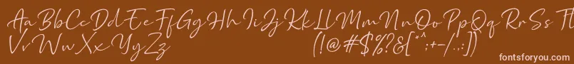 Marthin-fontti – vaaleanpunaiset fontit ruskealla taustalla