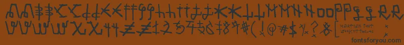 フォントMartian Font – 黒い文字が茶色の背景にあります