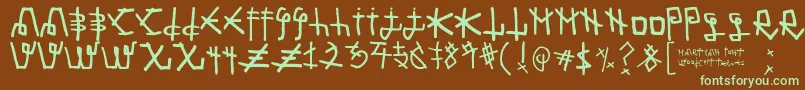 フォントMartian Font – 緑色の文字が茶色の背景にあります。