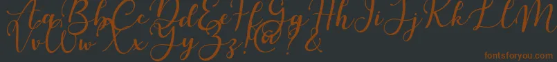 Шрифт Martinesse – коричневые шрифты на чёрном фоне