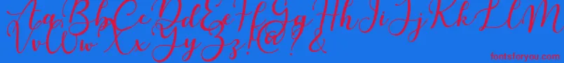 Martinesse-Schriftart – Rote Schriften auf blauem Hintergrund