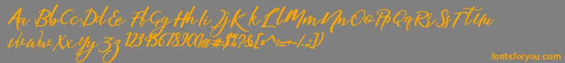 martini Font – Orange Fonts on Gray Background