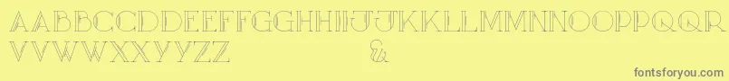 Mary CAPSOutline Font – Gray Fonts on Yellow Background